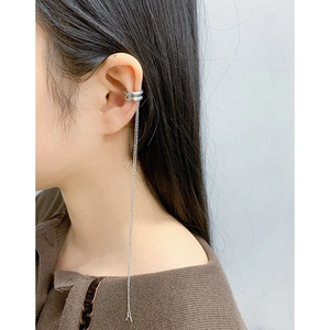Minimalist S925 sterling silver ear cuff with elegant long tassel chain on a model