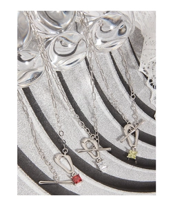 Detailed close-up of S925 silver OT toggle necklaces with vibrant square zircon pendants