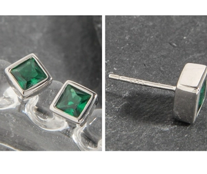 Detailed view of S925 sterling silver stamp and square green zircon stud earrings