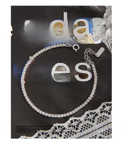 Macro detail of S925 sterling silver sparkling tennis bracelet with fine cubic zirconia