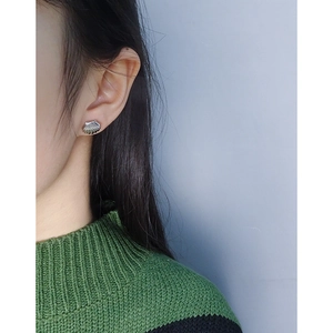 S925 sterling silver minimalist shell stud earrings shown on model for daily wear