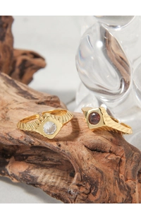 Detail of S925 sterling silver rings with geometric crowns and inlaid cubic zirconia