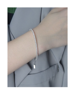 Close-up of S925 sterling silver tennis bracelet with shimmering cubic zirconia