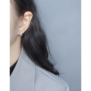 Minimalist S925 sterling silver hoop earrings with pave cubic zirconia on model