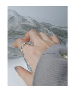 Detailed close-up of retro S925 sterling silver ring with engraved star patterns