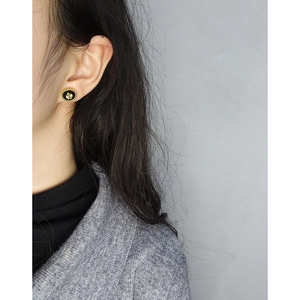 Elegant gold clover seal stud earrings for women with black enamel and beaded edge