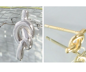 Macro detail of S925 sterling silver stamp on minimalist knot stud earrings