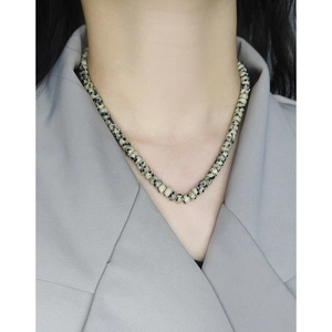 Minimalist S925 silver necklace with natural Dalmatian Jasper stone beads on female model