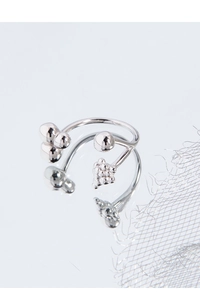 Detailed view of silver adjustable bubble ring with polished beads and mirror reflection
