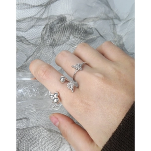 Set of three S925 sterling silver minimalist geometric rings worn on model hand
