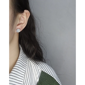 Minimalist S925 silver stud earrings with round jade stone shown on female model