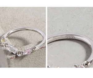 Makroaufnahme von S925 Sterlingsilber Ring mit bunten Edelsteinen und Punzierung