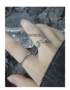 Detailansicht des S925 Sterlingsilber Kettengliedrings mit gelben und lila Schmucksteinen
