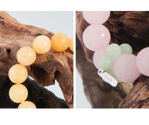 Macro shot of natural topaz and pink agate bracelets with S925 sterling silver tags