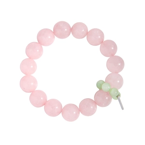 Pink rose quartz beaded bracelet with green agate accents and silver charm on white background
