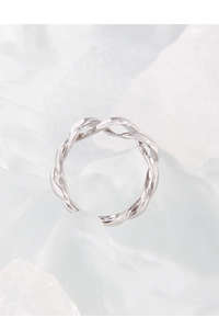 Macro detail of twisted S925 sterling silver ring showing polished braided texture