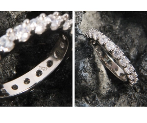 Macro shot of S925 sterling silver ring showing full pave zircon and hallmark details