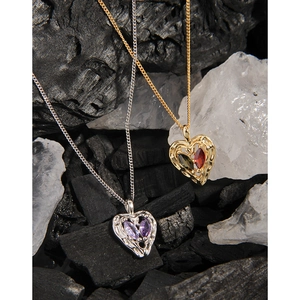 S925 sterling silver heart necklaces with colorful cubic zirconia on crystal background