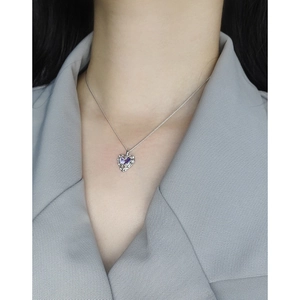 S925 sterling silver necklace with purple heart pendant and lava texture on model