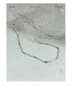 Detail of S925 silver bamboo link bracelet with multi-color beads and adjustable clasp