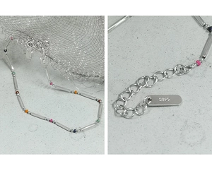 Close-up of S925 sterling silver rainbow bead bracelet with hallmark and spring clasp