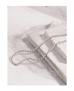 Détail du bracelet en perles d'argent S925 avec finition polie et chaîne d'extension