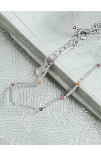 Detailed shot of S925 silver bamboo link necklace with colorful beads on a stone background