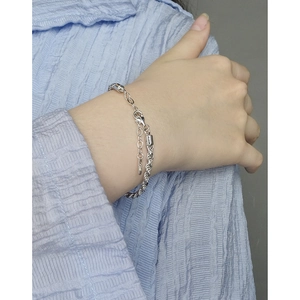 Elegant S925 sterling silver twist rope chain bracelet featuring a minimalist dual-link design