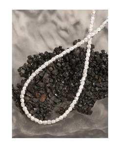 Close-up of S925 sterling silver beaded necklace with irregular geometric faceted design