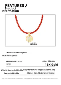 Detail view of S925 sterling silver red bead necklace with engraved golden M pendant