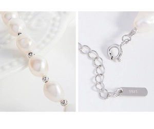 Detail of S925 sterling silver clasp and natural baroque pearls on a luxury bracelet