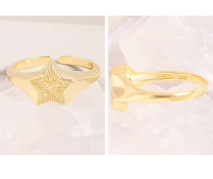 Close-up of S925 sterling silver open star ring with golden plating and engraved details