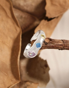 Detail of S925 silver adjustable ring with three colorful geometric zircon stones