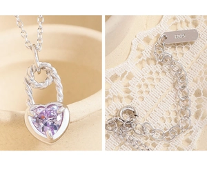 Detailed macro view of S925 sterling silver necklace with purple zircon heart pendant