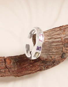 Close-up of S925 silver adjustable ring with colorful baguette-cut zircon gemstones