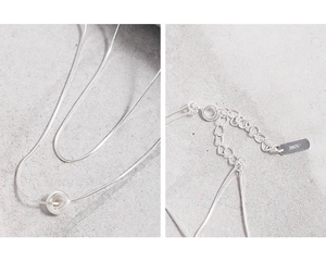 Detailed close-up of S925 sterling silver snake chain showing clasp and hallmark stamp