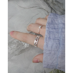 Polished S925 sterling silver ring set featuring wavy band and hollow lace texture