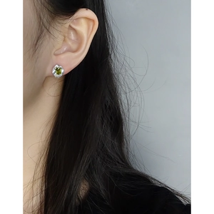 S925 silver stud earrings with emerald-cut green zircon and shimmering white stones