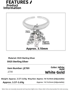 Detail of S925 sterling silver adjustable ring featuring hanging pearls and silver beads