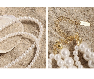 Detail of S925 sterling silver lobster clasp and multilayer pearls on heart necklace