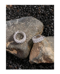 Detailed close-up of S925 sterling silver hoop earrings with pavé rectangular cubic zirconia
