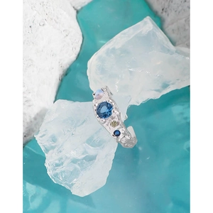 S925 silver lava texture ring featuring blue zircon and moonstone on an icy background