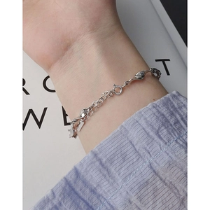 Minimalist S925 sterling silver Mobius bracelet for women featuring a twisted metal design