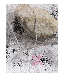 Macro shot of S925 silver necklace with cherry blossom pendant and pink zircon petals