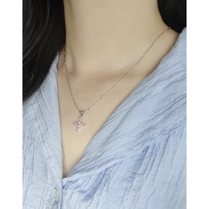 Minimalist S925 sterling silver necklace with pink cherry blossom zircon pendant on model