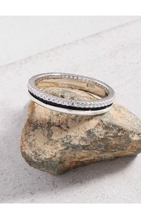 Macro shot of S925 silver ring featuring zircon inlay and black enamel details