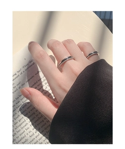 Detail shot of minimalist S925 sterling silver ring with double layer zircon inlay on hand