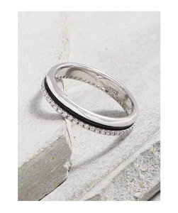 Macro view of S925 sterling silver ring with black enamel inlay and pavé zircon details