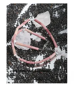 Detail of S925 silver necklace with pink rhodochrosite stones and adjustable lobster clasp