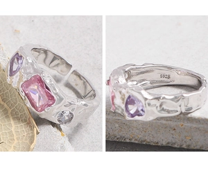 Detail of S925 sterling silver ring featuring wrinkled texture and colorful zircon stones